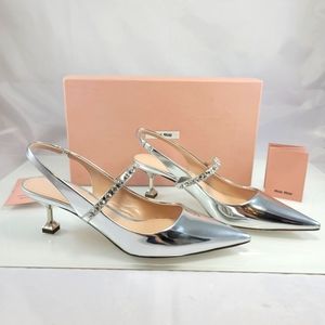 MIU MIU Slingback Crystal Pumps